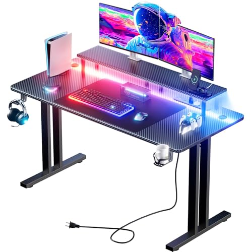 Image of HLDIRECT 55 Inch Gaming Desk with LED Lights & Cable Management, Black | Ergonomic carbon fiber gaming computer desk with 5 sockets, monitor stand, cup holder, headphone hook & mouse pad for gamers