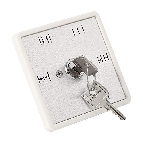 Interruptor de llave para puerta corrediza automática instalado en accesos de oficinas