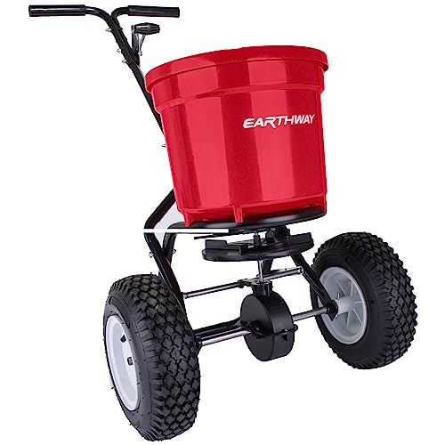 EarthWay 2150 Commercial 50 LB Broadcast Fertilizer Spreader. Heavy-Duty Walk-Behind Push Garden Seeder with Adjustable Drop Rate and Driving Handle. Large 13 inch Pneumatic Stud Tires