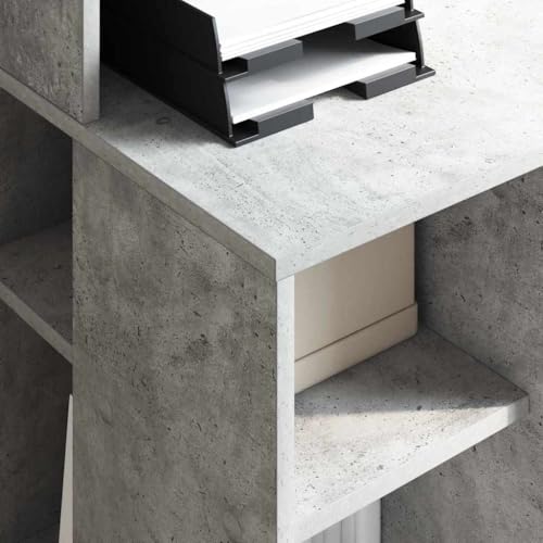 Bureau informatique gris béton avec étagères de rangement pour petit espace