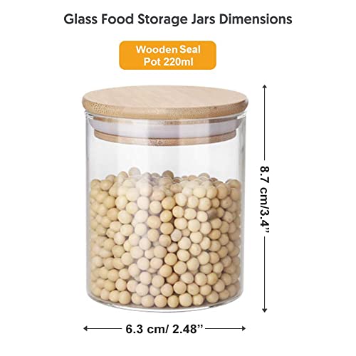 Image of ComSaf Glass Food Storage Canister with Airtight Bamboo Lid (220ml), Clear Glass Jar Container with Seal Wooden Lid for Kitchen Pantry Serving Tea Coffee Sugar Flour Spices (Set Of 12, 220ml)