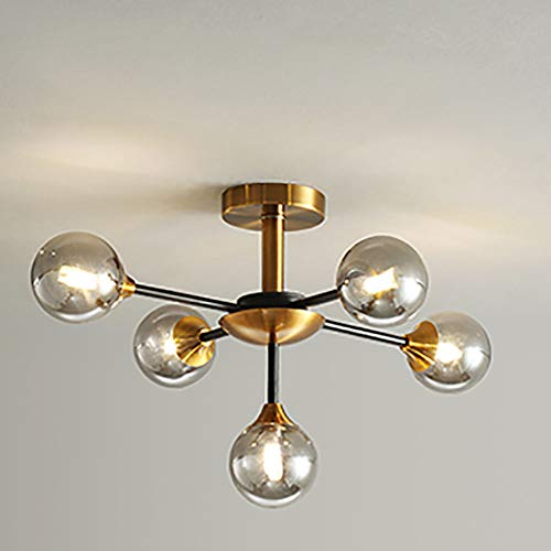Lustre suspendu mi-siècle aux finitions verre globe d'exception