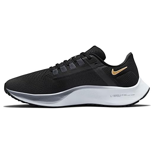 NIKE Wmns Air Zoom Pegasus 38, Zapatillas Deportivas Mujer, Black Mtlc Gold Coin Thunder Blue Ashen Slate Football Grey, 40 EU