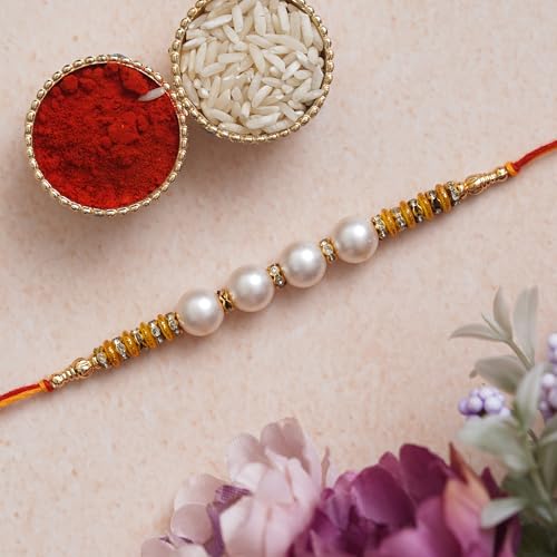 Image of eCraftIndia Pearls Rakhi for Brother with Best Bro Ever Fridge Magnet and Roli Chawal Pack