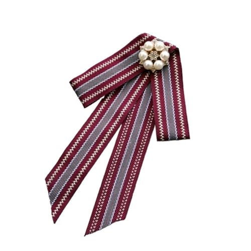 Nœud papillon femme rayé style vintage pour sublimer un chemisier de bureau