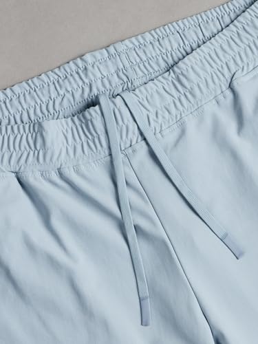 Image of TECHNOSPORT Womens Mid Rise Polyester Regular Fit Solid Jogger for Running, Workout & Sports