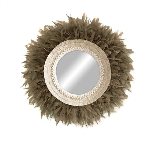 Miroir mural avec plumes pour décorer un mur blanc vide