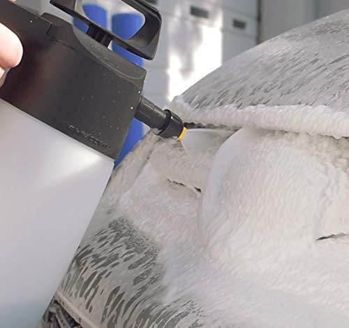 iK Foam 1.5 Sprayer applying foam to a car interior