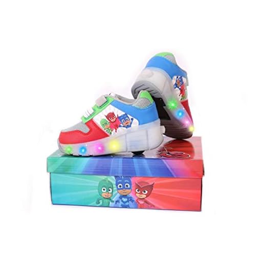 PJ MASKS upplysta hjul träningsskor för pojkar och flickor. Hjulklacksträningsskor med en PJ maskerdesign. Catboy, OWLETTE och GeKKO. Vit, röd, grön och blå tränare med hjul. Storlek: UK 11-11,5/EU 30