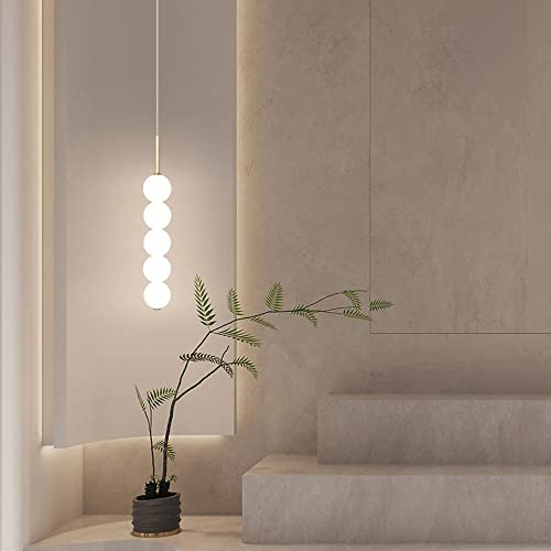 Lampe suspendue de chevet pour une ambiance cocooning dans la chambre