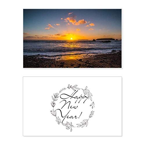 Tarjeta conmemorativa de año nuevo con diseño de playa y mar natural