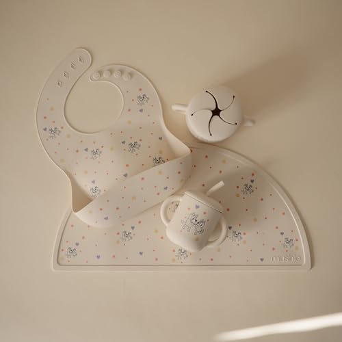 Image of mushie x Bluey Silicone Baby Bib | Adjustable Fit Waterproof Bibs (Bluey Ivory)
