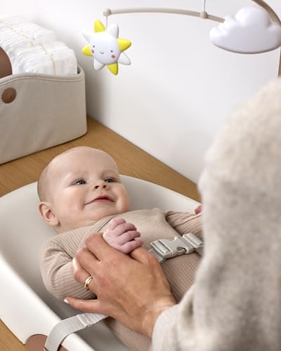 Image of Skip Hop Baby Changing Pad Nursery Style Wipe-Clean Contoured with Cushioned Foam, Non-Skid Base, Built-in Safety Belt & Tuck-Away Toy Bar Fits Standard Changing Tables, Oat