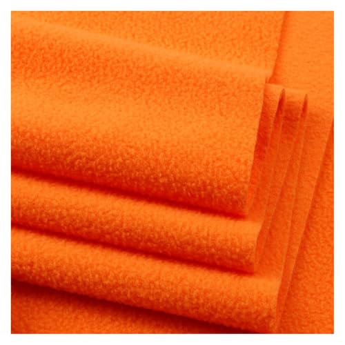 Tissu polaire tricoté contre le froid matériau épais orange pour vêtements