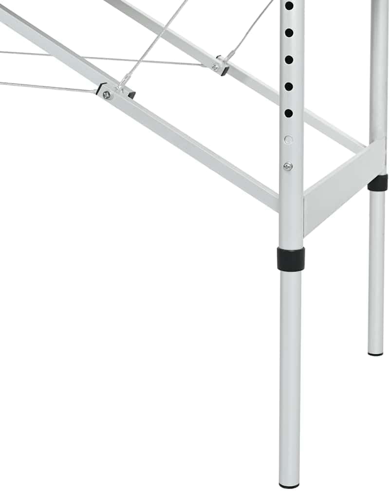 Close-up of massage table leg with height adjustment holes
