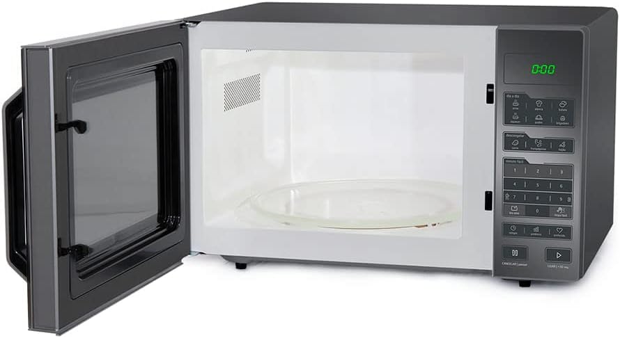 Imagem lateral do micro-ondas com fundo neutro. Imagem lateral do micro-ondas com fundo neutro.