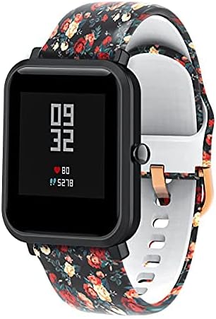 Smartwatch with black floral band attached, front view
