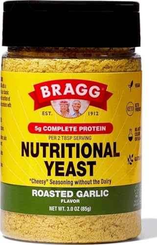Image of Bragg Roasted Garlic Nutritional Yeast Seasoning 3 oz - Vegan Dairy-Free | Kosher, non-GMO, savory umami flavor, good source of protein & B12, great on popcorn, pasta & veggies