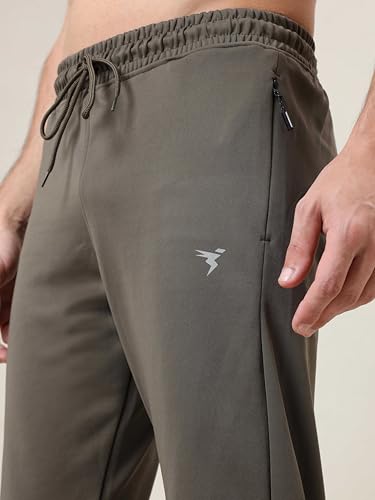 Image of TECHNOSPORT Men's Slim Fit Track Pants with Zip Pockets, ELASTO Plus Quick Dry Stretchable Lightweight Lower for Gym Running Yoga and Sports