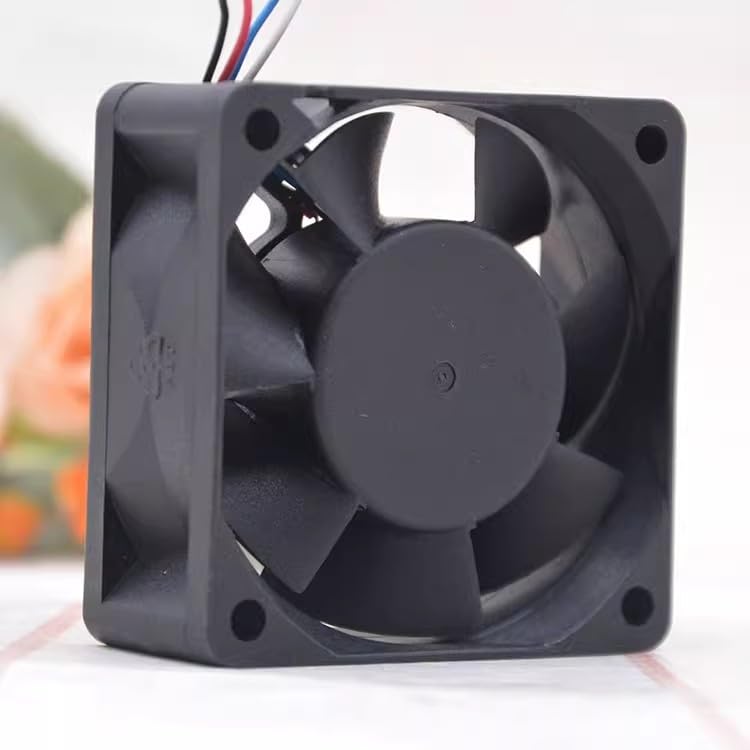 Angled rear view of the REAMTONY 6025 cooling fan, showing the fan blades and mounting holes from a slightly different angle.