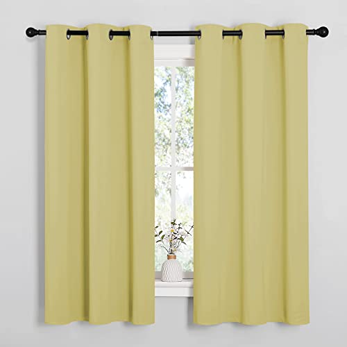 Image of NICETOWN Window Curtain Panels, Thermal Insulated Solid Grommet Blackout Draperies /Drapes for Basement (Paler Yellow, 1 Pair, 34 by 54-inch)