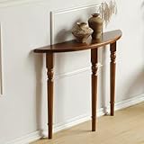 Dotée d'une forme minimaliste en demi-cercle et d'une silhouette élancée avec des lignes épurées et une finition polie, cette table complète les styles de décoration modernes, contemporains ou minimalistes, améliorant l'ambiance gracieuse de n'importe quel espace sans paraître encombrante.