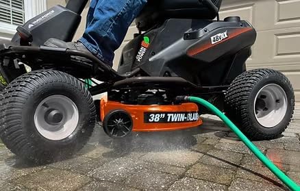 Cleaning the underside of the cutting deck with a hose