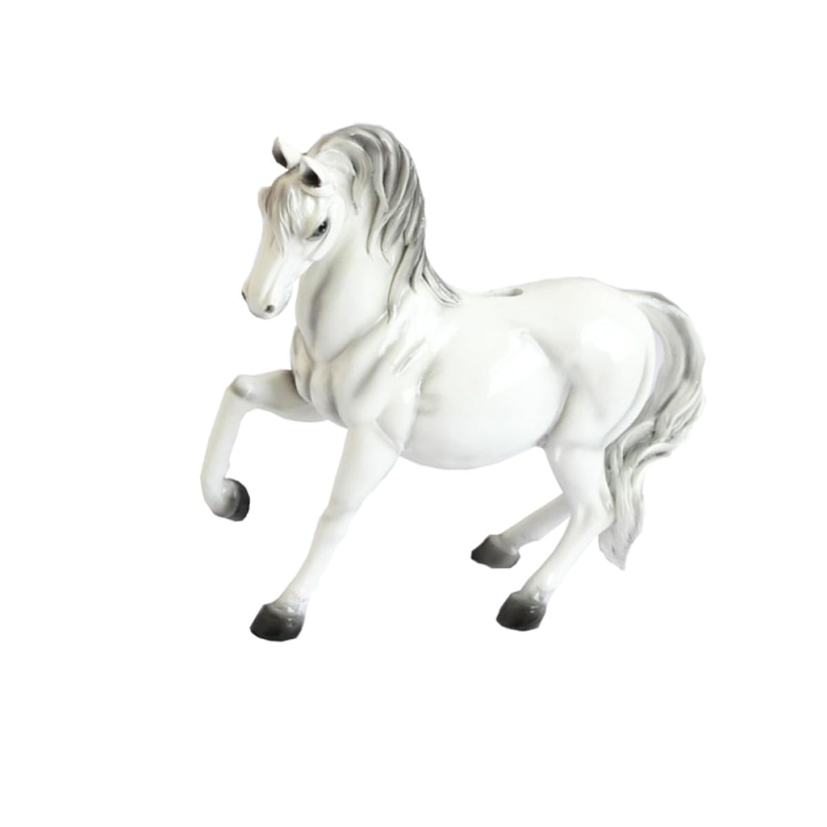 Tirelire artistique cheval sur une table de chevet d'enfant