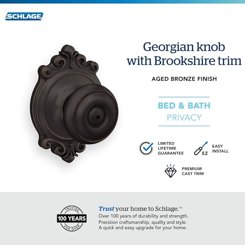 Image of Schlage F40 GEO 716 BRK Georgian Door Knob with Brookshire Trim, Bed & Bath Privacy Lock, Aged Bronze