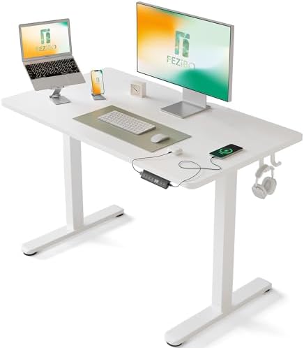 FEZIBO Escritorio Eléctrico de Pie - 100 * 60 cm Mesa Altura Ajustable con Tablero, Pies en T de Acero, Sistema Anticolisión, Panel Control con Funciones Memoria