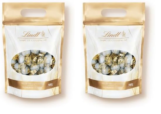 Lindt Schokolade Marc de Champagne Kugeln | 700 g | Ca. 56 Vollmilch-Schokoladen mit erlesener Füllung, alkoholhaltig | Großpackung | Pralinengeschenk | Schokoladengeschenk (Packung mit 2)
