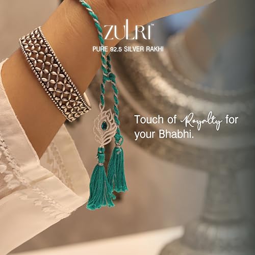 Image of 92.5 Sterling Silver Peacock Feather with Stone Thread Rakhi For Rakshabandhan | Rakhi With Fragrance Greeting Card & Roli Chawal and Silver Certificate of Authenticity