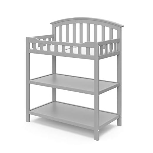 Graco Changing Table with Water-Resistant Change Pad and Safety Strap, Pebble Gray, Multi Storage Nursery Changing Table for Infants or Babies