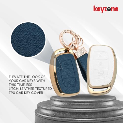 Image of Keyzone Litchi Leather Textured TPU Key Cover & Keychain for Exter, Creta, i20, Aura, Xcent, Tucson, Elantra, Verna, Grand i10 3 Button Smart Key (White)
