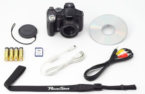 Contents of the Canon PowerShot S5 IS box, including camera, batteries, cables, and manual