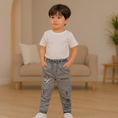 Image of Stylish Printed Joggers with Pockets | Soft Comfortable Elastic Waist Lower | Casual Outdoor Wear Trousers for Daily Use |Pack of 1 Boys Premium Cotton Satin Jeans Cargo Track Pants for Kids 2-7 Years