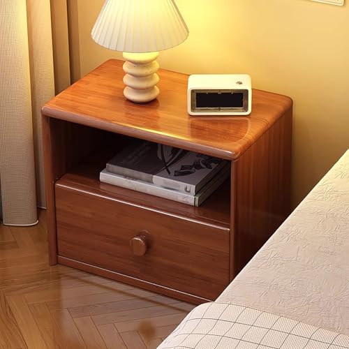 Table de chevet en bois massif avec tiroir semi-ouvert pour optimiser le rangement