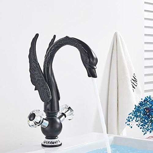 Robinet de cuisine monté sur le pont en laiton or noir style cygne pour évier moderne