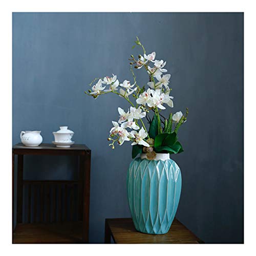 Specifiche: Petalo Materiale: Oltre a pettine / seta Panni;Vaso Materiale: Ceramica;Colore Petalo: arancione / bianco;Vaso Colore: Retro Ciano;Vaso Larghezza: ca.20 centimetri;Vaso Altezza: ca.30 centimetri;Larghezza totale: ca.35 centimetri;Altezza totale: ca.75 centimetri.