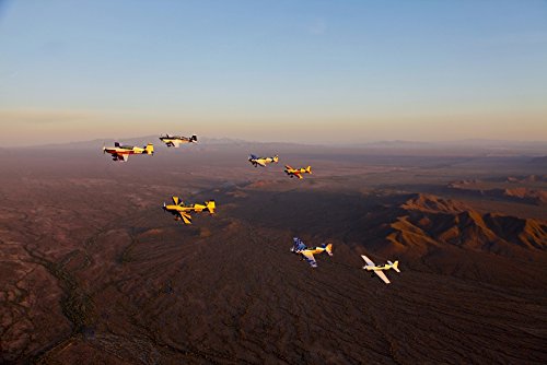 Posterazzi PSTSGR100141M Extra 300 aerobatic aircraft fly in formation during APS training in Mesa...