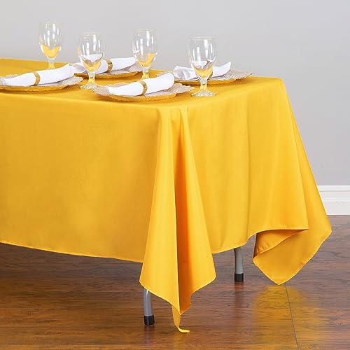 Nappe rectangle polyester dorée 70x120 pour repas de Noël