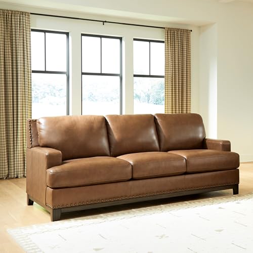 Image of Signature Design by Ashley Leather Couch, 90 in, Amber Brown, Brendola | Premium top grain leather, Matching faux exterior, Anti-sag platform foundation, Nailhead trim, No assembly required