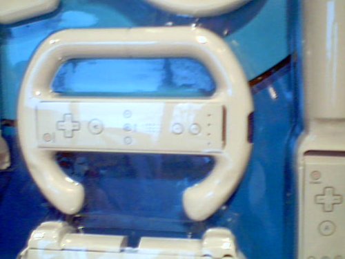 Zenex on the Move Wii Gaming Accessories 7-in-1 Sports Pack Blister Package Version Model#301-9713 for Nintendo Wii System---comes with Wii Tennis Racquet, Wii Golf Club, Wii Baseball Bat, Wii Pistol, Wii Steering Wheel, Wii Remote Grip, & Wii Remote Handle---user Friendly Snap-in Design Comfortable Converts Wii Controller Into 6 Different Gaming Kits---each of the Sets Are for Use with Compatible Wii Console Game. The Accessories Set Help Simulate the Corresponding Game Actions. (Nintendo Wii System Console Version)