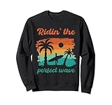 Riding perfect waves Surfing SUP at the Beach