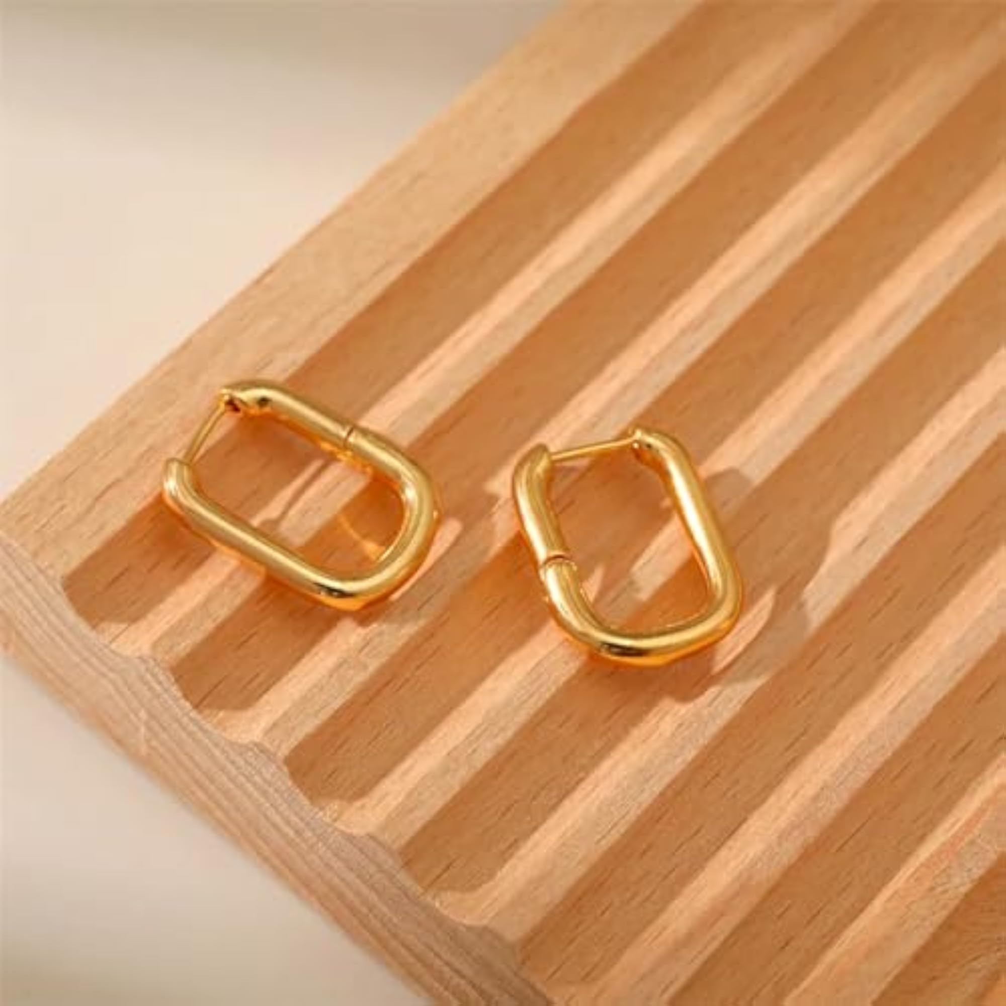 Gold Earrings in Dainty, Chunky, Huggie & Bow Styles