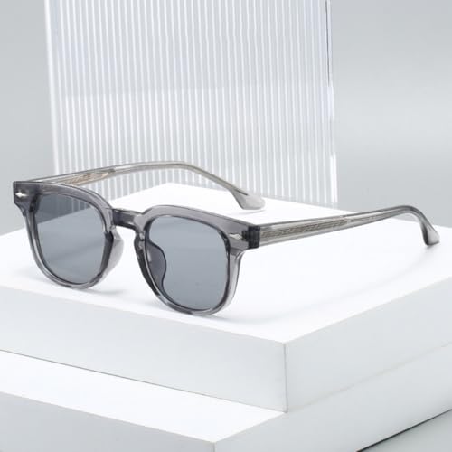 Lunettes de soleil rétro vert thé avec rivets métalliques vintage chic