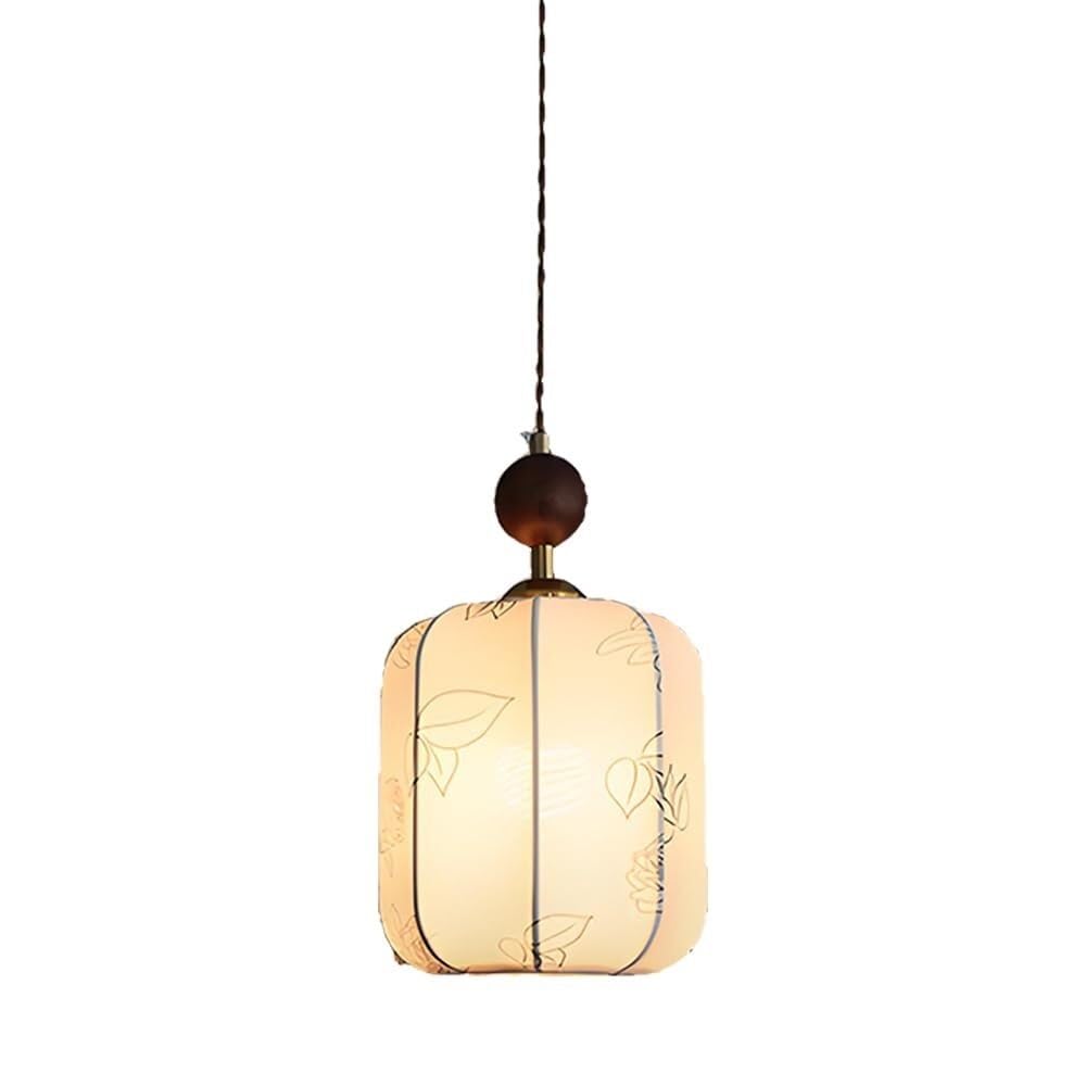 Lustre suspendu en tissu blanc pour ambiance feutrée de salon et chambre