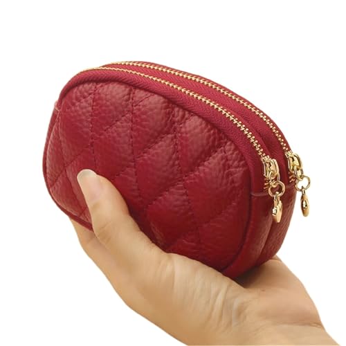 Monedero pequeño rojo que soluciona la falta de espacio en bolsos con su gran capacidad