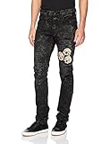 Patch with multiple skulls on the front left thigh of the jean
