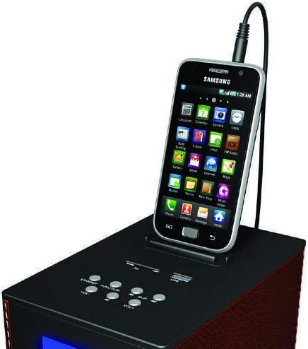 Close-up of the TW1 top panel with a Samsung smartphone connected via AUX